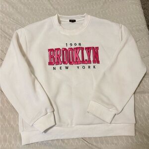 Women's White Crew Neck Sweater with Pink Brooklyn New York Design
